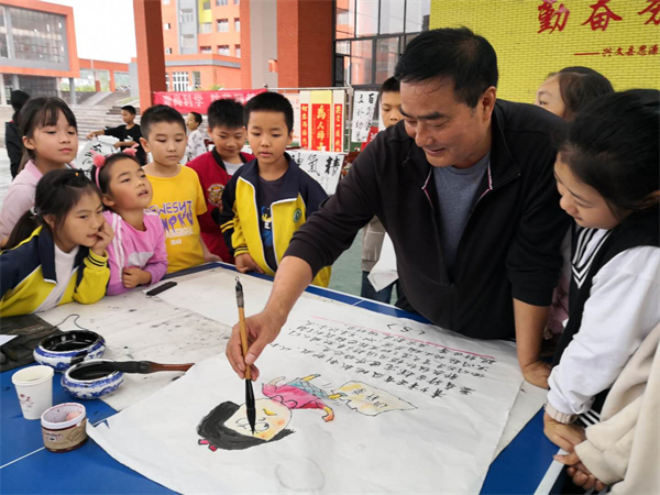思源学校开展“迎六一节 崇尚科学 防范邪教”宣传活动.jpg 思源学校开展“迎六一节 崇尚科学 防范邪教”宣传活动.jpg
